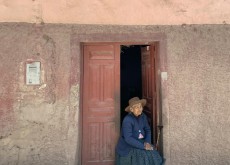 Woman In Doorway Peru
