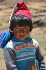 Portrait Of Young Boy Taquile Island Peru